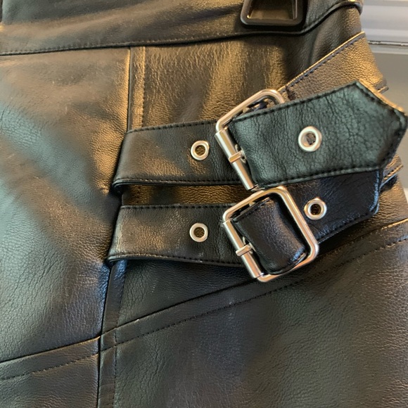Black “leather” skirt with silver buckling - Picture 3 of 6